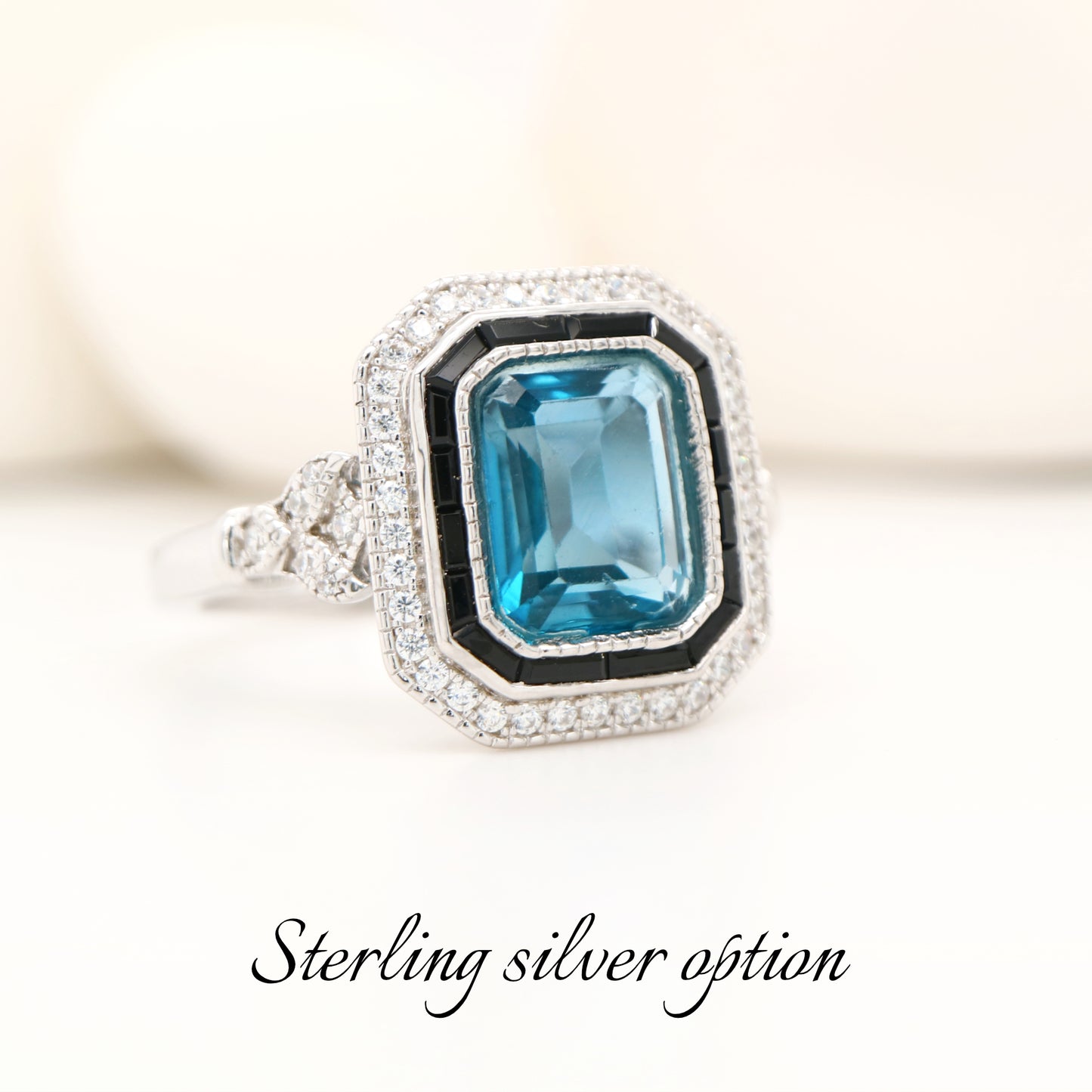 Onyx halo art deco ring with london blue topaz in sterling silver
