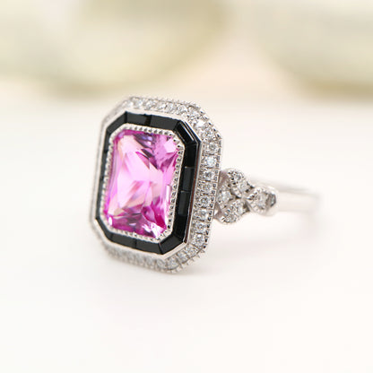 Art deco ring with laboratory grown pink sapphire, onyx and cz halo in sterling silver