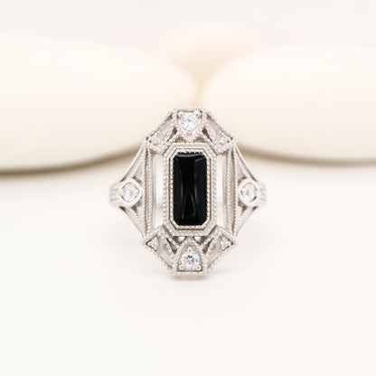 Cocktail shield ring with onyx and diamonds in sterling silver
