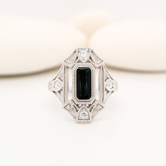 Cocktail shield ring with onyx and diamonds in sterling silver
