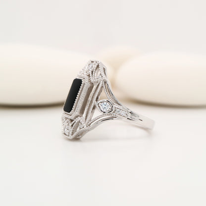 Cocktail shield ring with onyx and diamonds in sterling silver