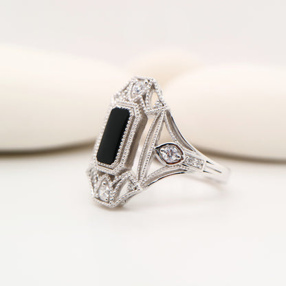 Cocktail shield ring with onyx and diamonds in sterling silver