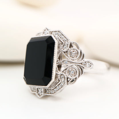 Onyx cocktail ring with diamonds in sterling silver