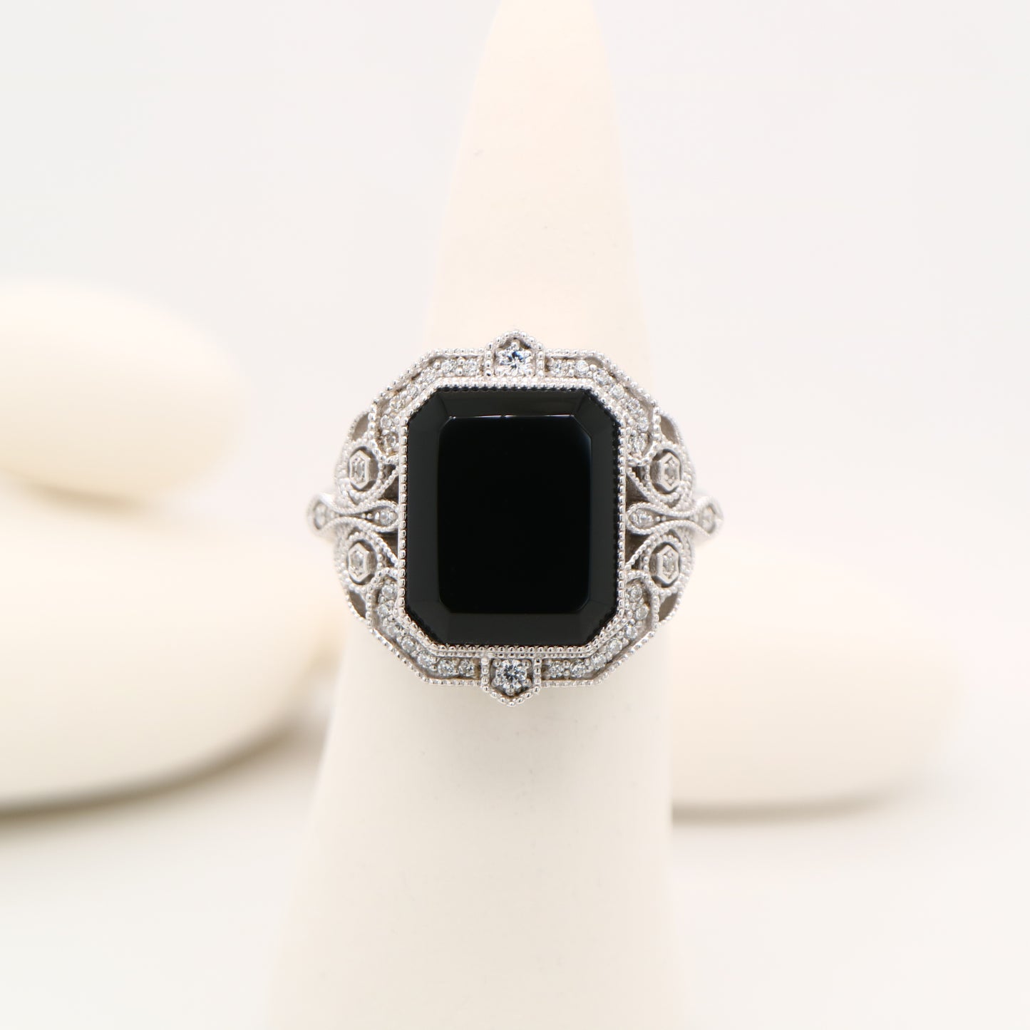 Onyx cocktail ring with diamonds in sterling silver