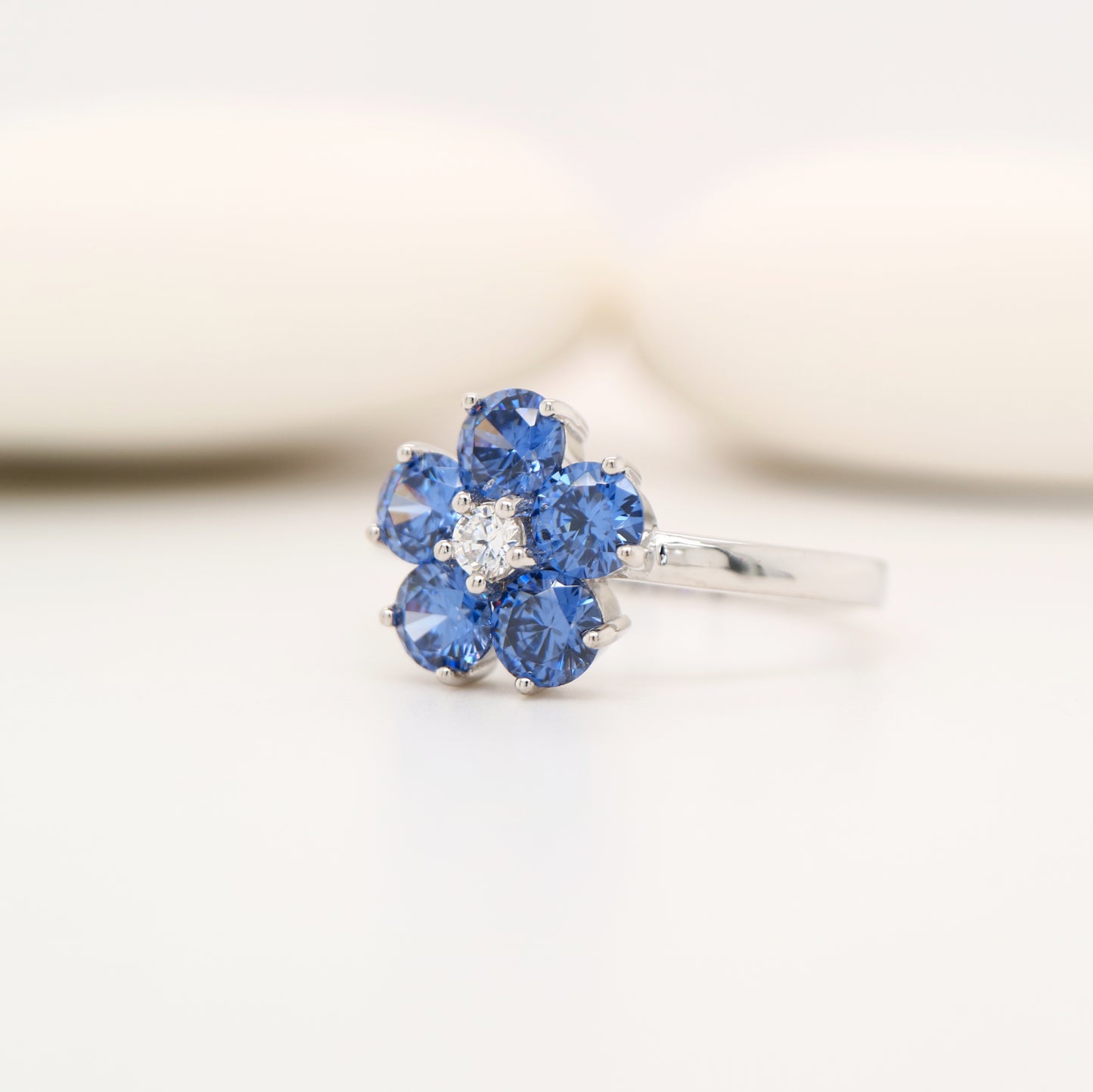 Cherry blossom ring with laboratory grown sapphire in sterling silver
