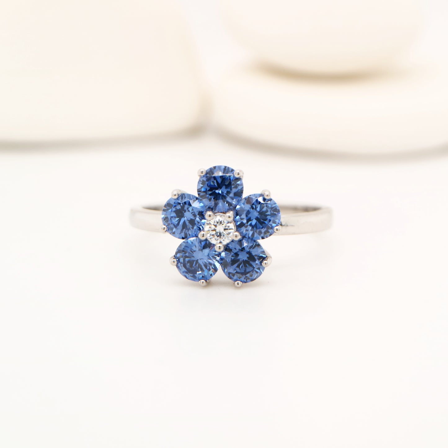 Cherry blossom ring with laboratory grown sapphire in sterling silver