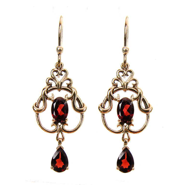 Art nouveau style earrings with garnet in 9k yellow gold