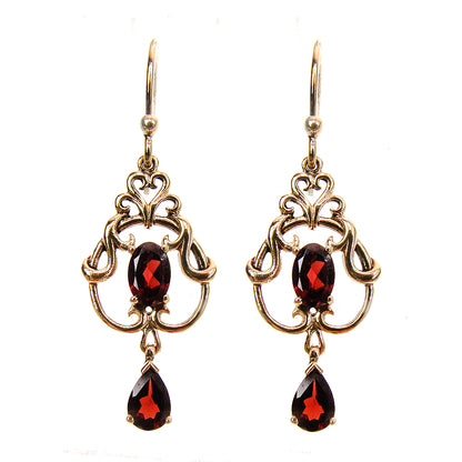 Art nouveau style earrings with garnet in 9k yellow gold