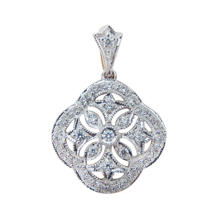 Filigree pendant with diamonds in 9k yellow gold