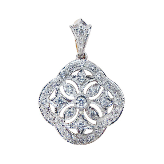 Filigree pendant with diamonds in 9k yellow gold